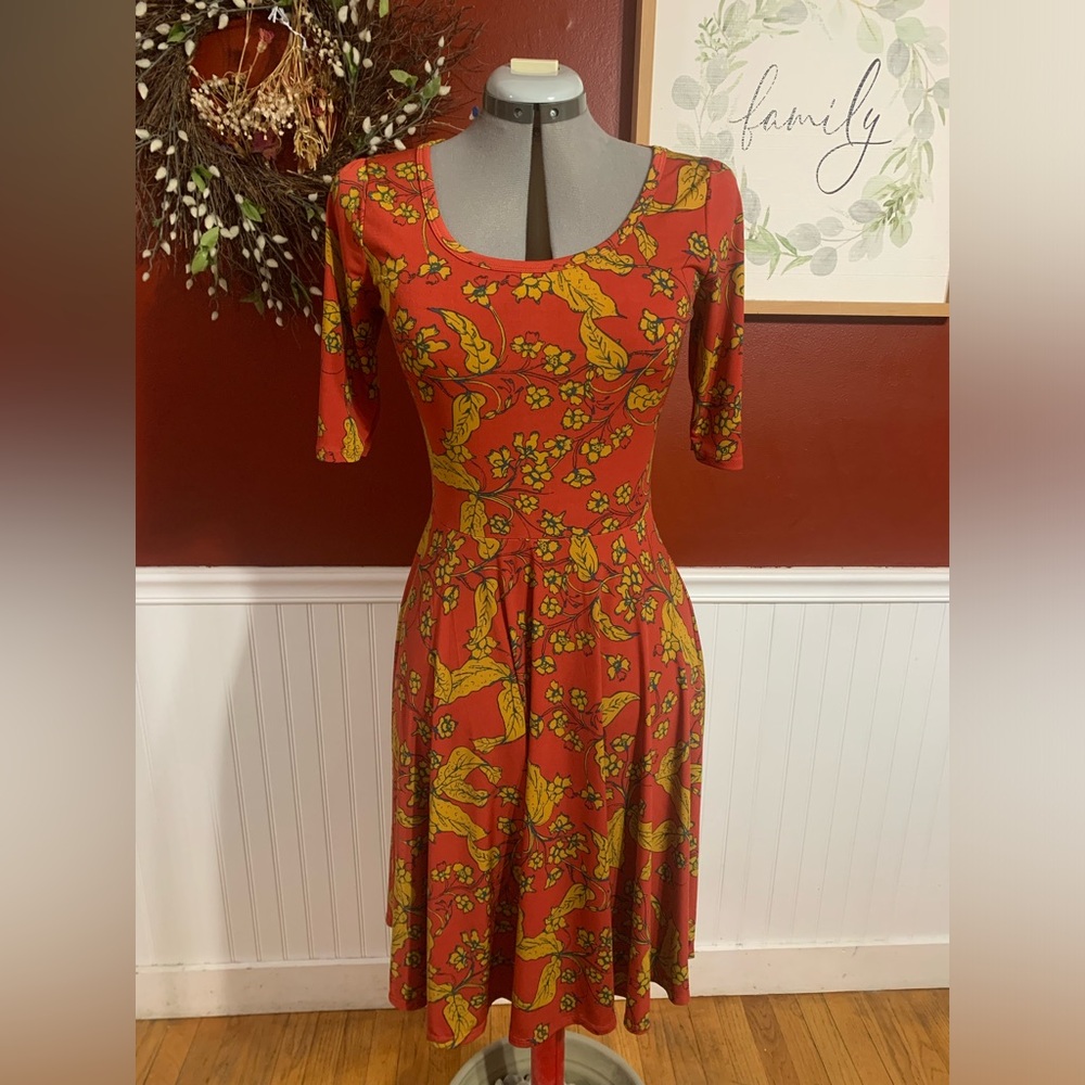 Unique Lularoe Red and Gold flower design dress.